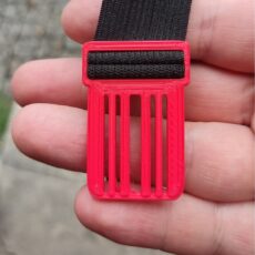 regulator paska z druku 3D-trwały, lekki element w kolorze czerwonym 3D zaprojektowany do mocowania taśm lub pasków technicznych-promocjepolska